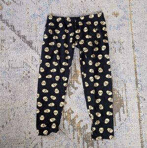y2k Gold No Boundaries Skull Print Black Capri Leggings